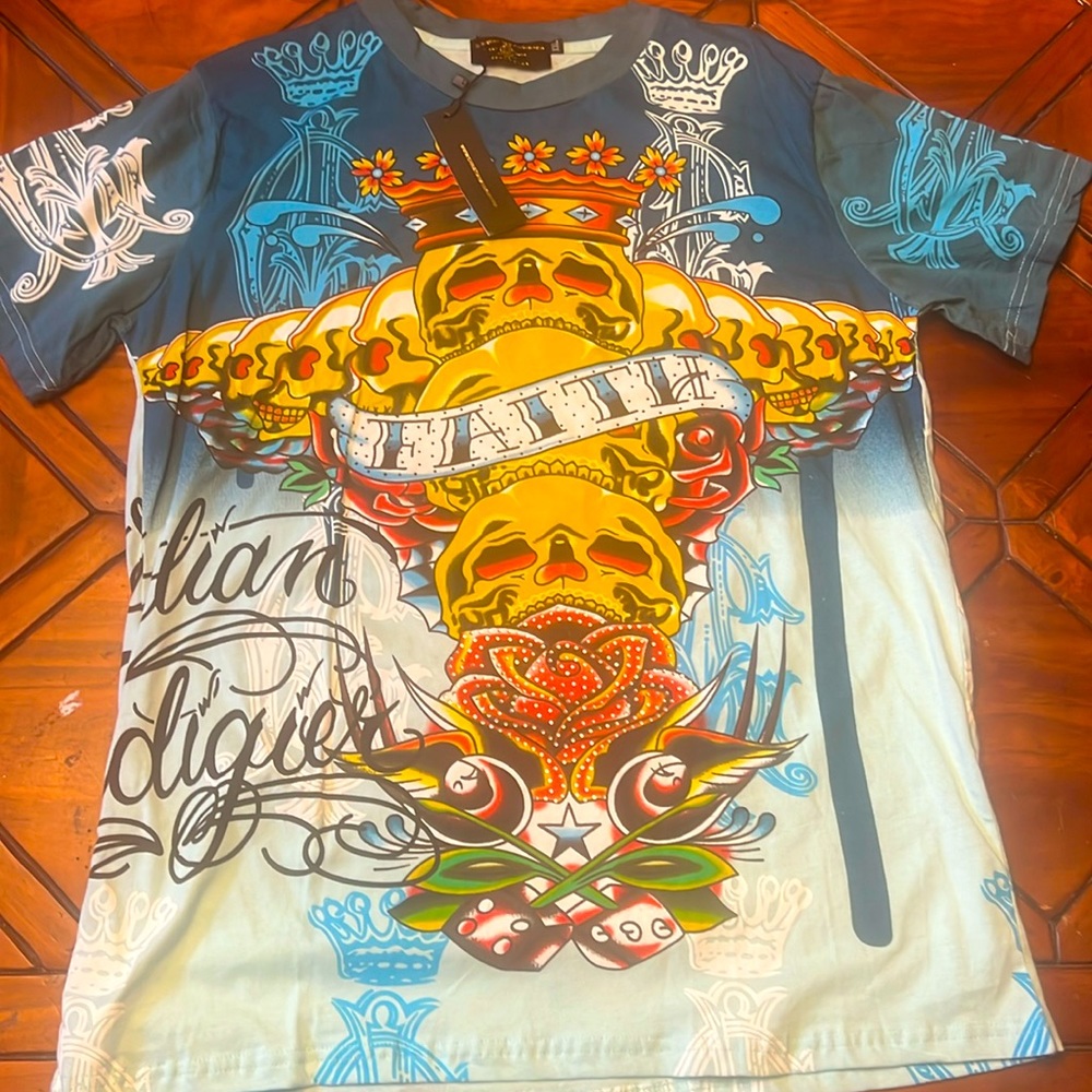 New with tags Christian Audigier t shirt xxl fits like a Large.